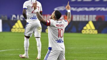 Lyon&#039;s Dutch forward Memphis Depay celebrates after scoring during the French L1 football match between Olympique Lyonnais and Racing Club Strasbourg Alsace at the Groupama Stadium in Decines-Charpieu, near Lyon, central-eastern France on February 6,