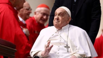 FILE PHOTO: Pope Francis greets cardinals as he unexpectedly appears during the Palm Sunday Mass in Saint Peter's Square at the Vatican, April 13, 2025. REUTERS/Yara Nardi/File Photo