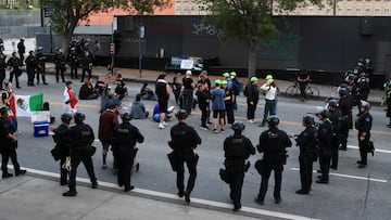 Law enforcement officers detain protesters during a protest against federal immigration sweeps, in Los Angeles, California, U.S., June 11, 2025. REUTERS/David Swanson