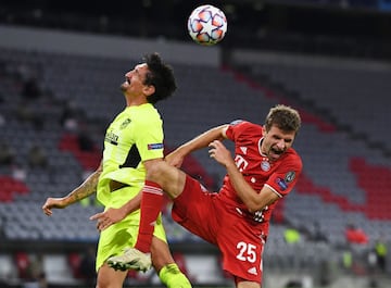 Stefan Savic y Thomas Mueller.