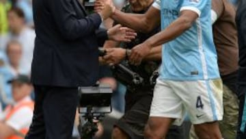 Vicent Kompany y Manuel Pellegrini