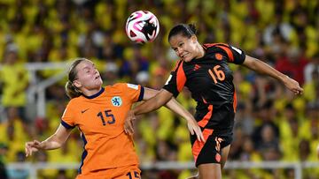 Netherlands' midfielder Jet Van Beijeren (L) and Colombia's midfielder Juana Ortegon jump to head the ball during the 2024 FIFA U-20 Women's World Cup quarterfinal match between Netherlands and Colombia at the Pascual Guerrero stadium in Cali, Colombia, on September 15, 2024. (Photo by Nelson Rios / AFP)