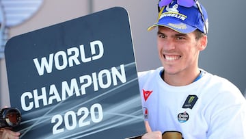 Suzuki Ecstar's Spanish rider Joan Mir celebrates after winning the MotoGP world championship after the Valencia Grand Prix at the Ricardo Tormo circuit in Valencia on November 15, 2020. (Photo by LLUIS GENE / AFP)