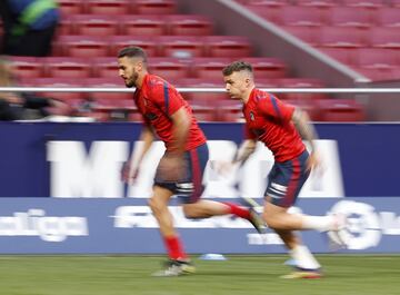 Koke y Trippier durante el calentamiento previo al encuentro. 
 