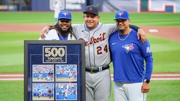 TORONTO, ON - APRIL 13: Miguel Cabrera #24 of the Detroit Tigers stands with Vladimir Guerrero Jr. #27 and former teammate Victor Martinez after the Toronto Blue Jays presented him with a frame of photos commemorating his 500th career home run, which he hit in Toronto the previous season, before their MLB game at the Rogers Centre on April 13, 2023 in Toronto, Ontario, Canada. Mark Blinch/Getty Images/AFP (Photo by MARK BLINCH / GETTY IMAGES NORTH AMERICA / Getty Images via AFP)