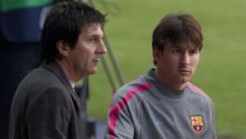 Leo Messi junto a su padre.