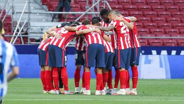 Los jugadores del Atlético hacen piña.