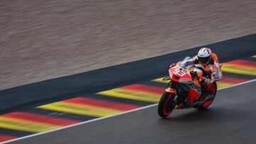 Honda Spanish rider Marc Marquez steers his motorbike during the qualifying session for the MotoGP German motorcycle Grand Prix at the Sachsenring racing circuit in Hohenstein-Ernstthal near Chemnitz, eastern Germany, on June 17, 2023. (Photo by Ronny Hartmann / AFP)