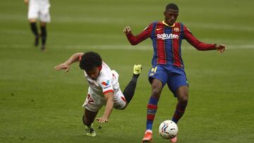 Koundé cae ante Dembelé.