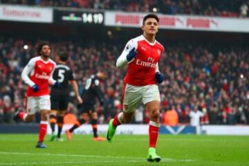 LONDON, ENGLAND - FEBRUARY 11: Alexis Sanchez of Arsenal celebrates scoring his side's second goal from the penalty spot during the Premier League match between Arsenal and Hull City at Emirates Stadium on February 11, 2017 in London, England. (Photo by Clive Rose/Getty Images)