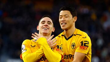 Soccer Football - Premier League - Wolverhampton Wanderers v West Ham United - Molineux Stadium, Wolverhampton, Britain - January 14, 2023 Wolverhampton Wanderers' Daniel Podence celebrates scoring their first goal with Hwang Hee-chan Action Images via Reuters/Andrew Boyers EDITORIAL USE ONLY. No use with unauthorized audio, video, data, fixture lists, club/league logos or 'live' services. Online in-match use limited to 75 images, no video emulation. No use in betting, games or single club /league/player publications. Please contact your account representative for further details.