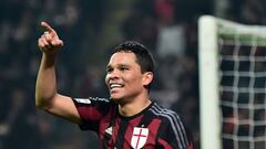 AC Milan&#039;s Colombian forward   Carlos Bacca celebrates after scoring a goal during  the Serie A football match between AC Milan and Inter Milan at the San Siro Stadium in Milan on January 31, 2015.  / AFP / GIUSEPPE CACACE