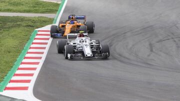 Alfa Romeo Sauber driver Charles Leclerc (16)  and McLaren driver Fernando Alonso (14) of Spain during the Spanish Formula One Grand Prix race on 13th May 2018 in Barcelona, Spain. 