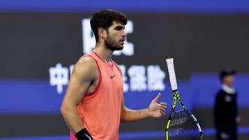 Tennis - China Open - China National Tennis Center, Beijing, China - October 2, 2024 Spain's Carlos Alcaraz reacts during his final match against Italy's Jannik Sinner REUTERS/Tingshu Wang