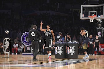 Spencer Dinwiddie y Jamal Murray.