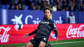 BARCELONA, SPAIN - FEBRUARY 13: Takefusa 'Take' Kubo of Real Sociedad celebrates after scoring his team's first goal during the LaLiga Santander match between RCD Espanyol and Real Sociedad at RCDE Stadium on February 13, 2023 in Barcelona, Spain. (Photo by Alex Caparros/Getty Images)