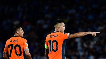 Inter Milan's Argentine forward #10 Lautaro Martinez celebrates after scoring his team's first goal during the UEFA Champions League