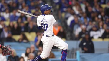 LOS ANGELES, CALIFORNIA - MARCH 29: Mookie Betts #50 of the Los Angeles Dodgers connects for a solo homerun during the first inning of a game against the St. Louis Cardinals at Dodger Stadium on March 29, 2024 in Los Angeles, California.   Sean M. Haffey/Getty Images/AFP (Photo by Sean M. Haffey / GETTY IMAGES NORTH AMERICA / Getty Images via AFP)