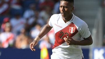 Peru's Pedro Aquino runs with the ball during the international friendly football match between Peru and New Zealand at�the RCDE Stadium in Cornella de Llobregat on June 5, 2022. (Photo by Jose Jordan / AFP)