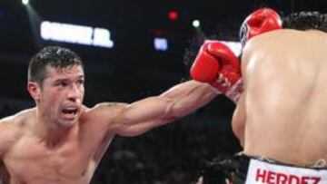 <b>DAÑO. </b>Maravilla, púgil zurdo, tuvo que boxear desde el cuarto asalto con su arma mermada.