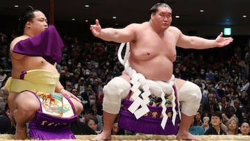 This photo taken on January 14, 2025 and release by Jiji Press on January 17 shows Mongolian-born grand champion Terunofuji (R) entering the ring at the New Year Grand Sumo Tournament in Tokyo. Terunofuji has decided to retire, the Japan Sumo Association said on January 16, 2025. (Photo by JIJI Press / AFP) / Japan OUT