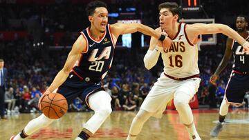 Mar 30, 2019; Los Angeles, CA, USA;  Los Angeles Clippers guard Landry Shamet (20) drives to the basket against Cleveland Cavaliers forward Cedi Osman (16) in the second half at Staples Center. Mandatory Credit: Jayne Kamin-Oncea-USA TODAY Sports