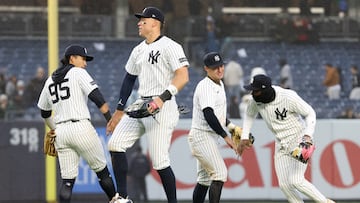 Apr 12, 2025; Bronx, New York, USA; New York Yankees third base Oswaldo Cabrera (95), outfielder Aaron Judge (99), shortstop Anthony Volpe (11) and third base Jazz Chisholm Jr. (13) react after the game against the San Francisco Giants at Yankee Stadium. Mandatory Credit: Tom Horak-Imagn Images