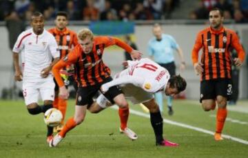 Krychowiak and Kovalenko dispute a ball at the Lviv Arena.