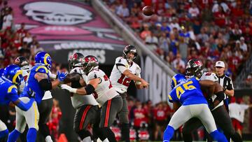 TAMPA, FLORIDA - NOVEMBER 06: Tom Brady #12 of the Tampa Bay Buccaneers passes the ball in the second quarter of a game against the Los Angeles Rams at Raymond James Stadium on November 06, 2022 in Tampa, Florida.   Julio Aguilar/Getty Images/AFP