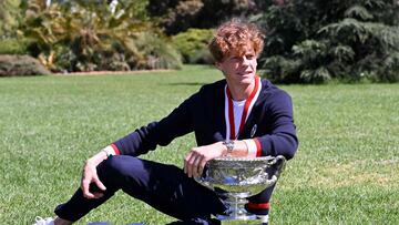 Italy's Jannik Sinner poses with the Norman Brookes Challenge Cup trophy at the Royal Botanic Gardens following his victory against Russia's Daniil Medvedev in the men's singles final match of the Australian Open tennis tournament in Melbourne on January 29, 2024. (Photo by WILLIAM WEST / AFP) / -- IMAGE RESTRICTED TO EDITORIAL USE - STRICTLY NO COMMERCIAL USE --