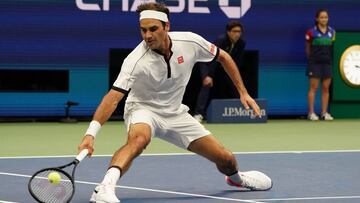 Roger Federer of Switzerland hits a return against Damir Dzumhur of Bosnia and Herzegovina during their Round Two Men's Singles tennis match at the 2019 US Open at the USTA Billie Jean King National Tennis Center in New York on August 28, 2019. (Photo by TIMOTHY A. CLARY / AFP)