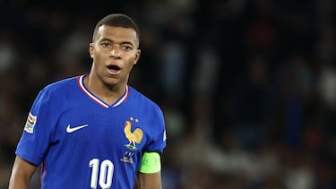 (FILES) France's forward #10 Kylian Mbappe reacts after his team lost the UEFA Nations League Group A2 football match between France and Italy at the Parc des Princes in Paris on September 6, 2024. Captain Kylian Mbappe, who was absent in October, has not been called up to the France squad for the Nations League matches against Israel (November 14) and Italy (November 17), coach Didier Deschamps announced on November 7, 2024. (Photo by Franck FIFE / AFP)
