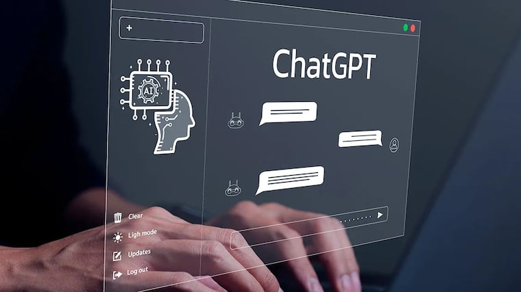 A person using a laptop to interact with an AI chatbot
