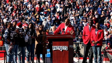 Former defensive tackle Richard Seymour of the New England Patriots at the podium for his hall of fame induction celebration during halftime in the game against the New York Jets at Gillette Stadium on October 24, 2021 in Foxborough, Massachusetts.