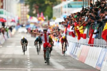 Michal Kwiatkowski of Poland celebrates winning the Elite Men's Road Race on day seven of the UCI Road World Championships on September 28, 2014 in Ponferrada, Spain.  (Photo by Bryn Lennon/Getty Images)