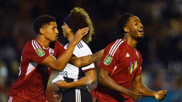 CRAWLEY, ENGLAND - AUGUST 23: James Balagizi of Crawley Town celebrates with teammate after scoring their team's second goal during the Carabao Cup Second Round match between Crawley Town and Fulham at Broadfield Stadium on August 23, 2022 in Crawley, England. (Photo by Mike Hewitt/Getty Images)