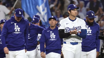 Los Angeles (United States), 06/10/2024.- Los Angeles Dodgers designated hitter Shohei Ohtani (R) reacts to the Dodgers winning the Major League Baseball (MLB) National League Division Series playoff game one against the San Diego Padres in Los Angeles, California, USA, 05 October 2024. The series is the best-of-five games. EFE/EPA/ALLISON DINNER