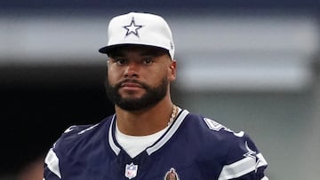 ARLINGTON, TEXAS - AUGUST 24: Dak Prescott #4 of the Dallas Cowboys looks on from the sideline during the first half of a preseason game against the Los Angeles Chargers at AT&T Stadium on August 24, 2024 in Arlington, Texas. Sam Hodde/Getty Images/AFP (Photo by Sam Hodde / GETTY IMAGES NORTH AMERICA / Getty Images via AFP)