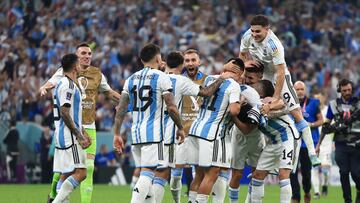 LUSAIL CITY, QATAR - DECEMBER 13: Argentina players celebrate their 3-0 victory in the FIFA World Cup Qatar 2022 semi final match between Argentina and Croatia at Lusail Stadium on December 13, 2022 in Lusail City, Qatar. (Photo by Buda Mendes/Getty Images)