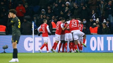 Reims' players celebrate after scoring their first goal during the French L1 football match between Paris Saint-Germain (PSG) and Stade de Reims at the Parc des Princes stadium in Paris on January 29, 2023. (Photo by Geoffroy VAN DER HASSELT / AFP) (Photo by GEOFFROY VAN DER HASSELT/AFP via Getty Images)