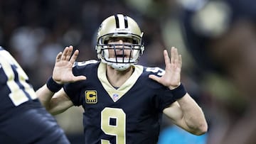 NEW ORLEANS, LA - NOVEMBER 19: Drew Brees #9 of the New Orleans Saints calls out the play at the line of scrimmage during a game against the Washington Redskins at Mercedes-Benz Superdome on November 19, 2017 in New Orleans, Louisiana. Saints defeated the Redskins 34-31. Wesley Hitt/Getty Images/AFP
== FOR NEWSPAPERS, INTERNET, TELCOS & TELEVISION USE ONLY ==