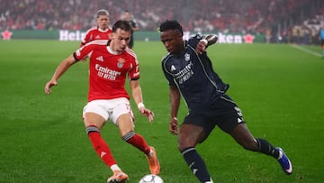 Soccer Football - UEFA Champions League - Benfica v Real Madrid - Estadio da Luz, Lisbon, Portugal - January 28, 2026 Benfica's Amar Dedic in action with Real Madrid's Vinicius Junior REUTERS/Pedro Nunes