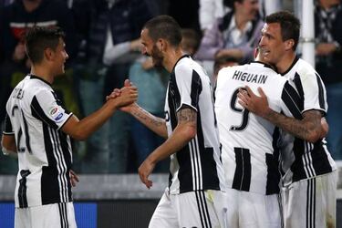 Juventus' Higuain brace in Monaco amid big game scrutiny