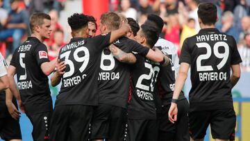Soccer Football - Bundesliga - Bayer Leverkusen v Eintracht Frankfurt - BayArena, Leverkusen, Germany - April 14, 2018 Bayer Leverkusen's Julian Brandt celebrates scoring their first goal with team mates REUTERS/Wolfgang Rattay DFL RULES TO LIMIT THE ONLINE USAGE DURING MATCH TIME TO 15 PICTURES PER GAME. IMAGE SEQUENCES TO SIMULATE VIDEO IS NOT ALLOWED AT ANY TIME. FOR FURTHER QUERIES PLEASE CONTACT DFL DIRECTLY AT + 49 69 650050