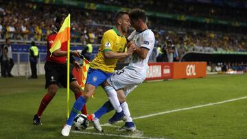 Brazil&#039;s Arthur, left, and Argentina&#039;s Nicolas Tagliafico fight for the ball during a Copa America semifinal soccer match at the Mineirao stadium in Belo Horizonte, Brazil, Tuesday, July 2, 2019. (AP Photo/Natacha Pisarenko)