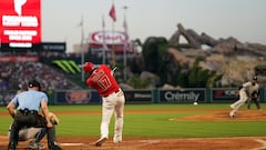 Jul 18, 2023; Anaheim, California, USA; Los Angeles Angels designated hitter Shohei Ohtani (17) follows through on a triple against New York Yankees starting pitcher Domingo German (0) in the fifth inning at Angel Stadium. Mandatory Credit: Kirby Lee-USA TODAY Sports