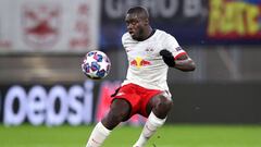 (FILES) This file photo taken on March 10, 2020 shows Leipzig&#039;s French defender Dayot Upamecano playing the ball during the UEFA Champions League round of 16 second leg football match between RB Leipzig and Tottenham Hotspur in Leipzig, eastern Germa