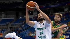 Lithuania�s #11 Domantas Sabonis pressures Mexico�s Joshua Ibarra during the 2024 FIBA Men's Olympic Qualifying Tournament basketball match between Lithuana and Mexico in San Juan, Puerto Rico, on July 2, 2024. (Photo by Ricardo ARDUENGO / AFP)