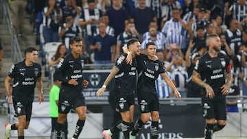 Monterrey's Argentine midfielder #29 Lucas Ocampos (C) celebrates with teammates after scoring a goal during the Liga MX Apertura football tournament match between Monterrey and Santos at the BBVA Stadium in Monterrey, Nuevo Leon state, Mexico on September 27, 2025. (Photo by Julio Cesar AGUILAR / AFP)