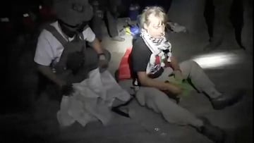 A screengrab from a video shows Swedish activist Greta Thunberg sitting next to a person wearing tactical gear, as vessels of the Global Sumud Flotilla are being intercepted by Israeli security forces, October 1, 2025. Israel Foreign Ministry/Handout via REUTERS THIS IMAGE HAS BEEN SUPPLIED BY A THIRD PARTY. MANDATORY CREDIT. NO RESALES. NO ARCHIVES.